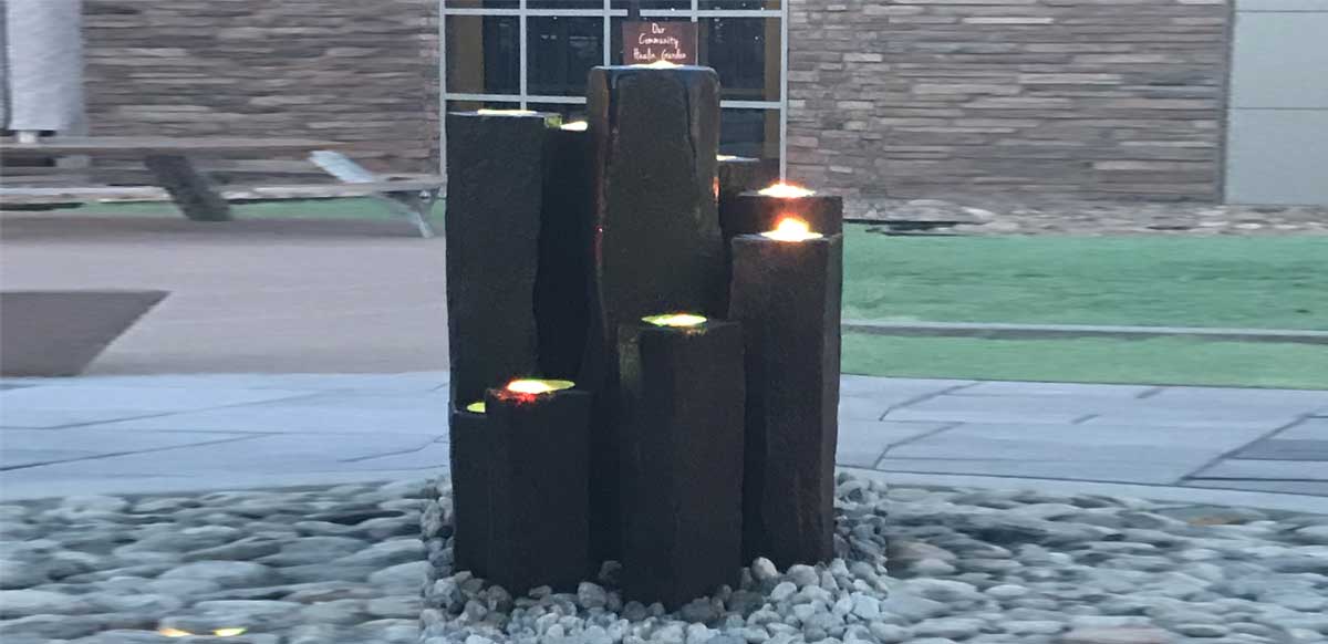 Black water fountain with lights